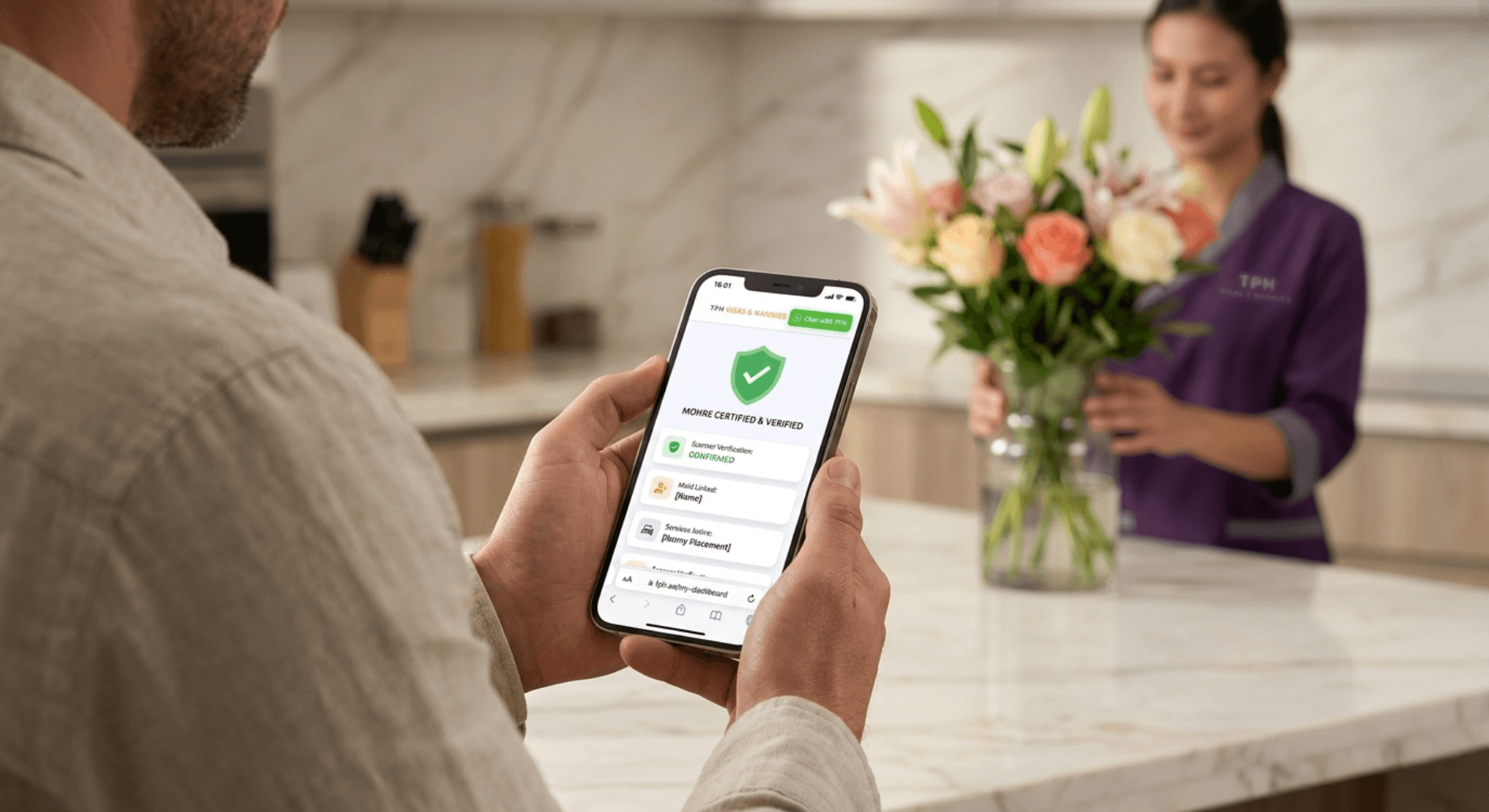 Man checking MOHRE verification on phone while hiring through a housemaid agency in Dubai