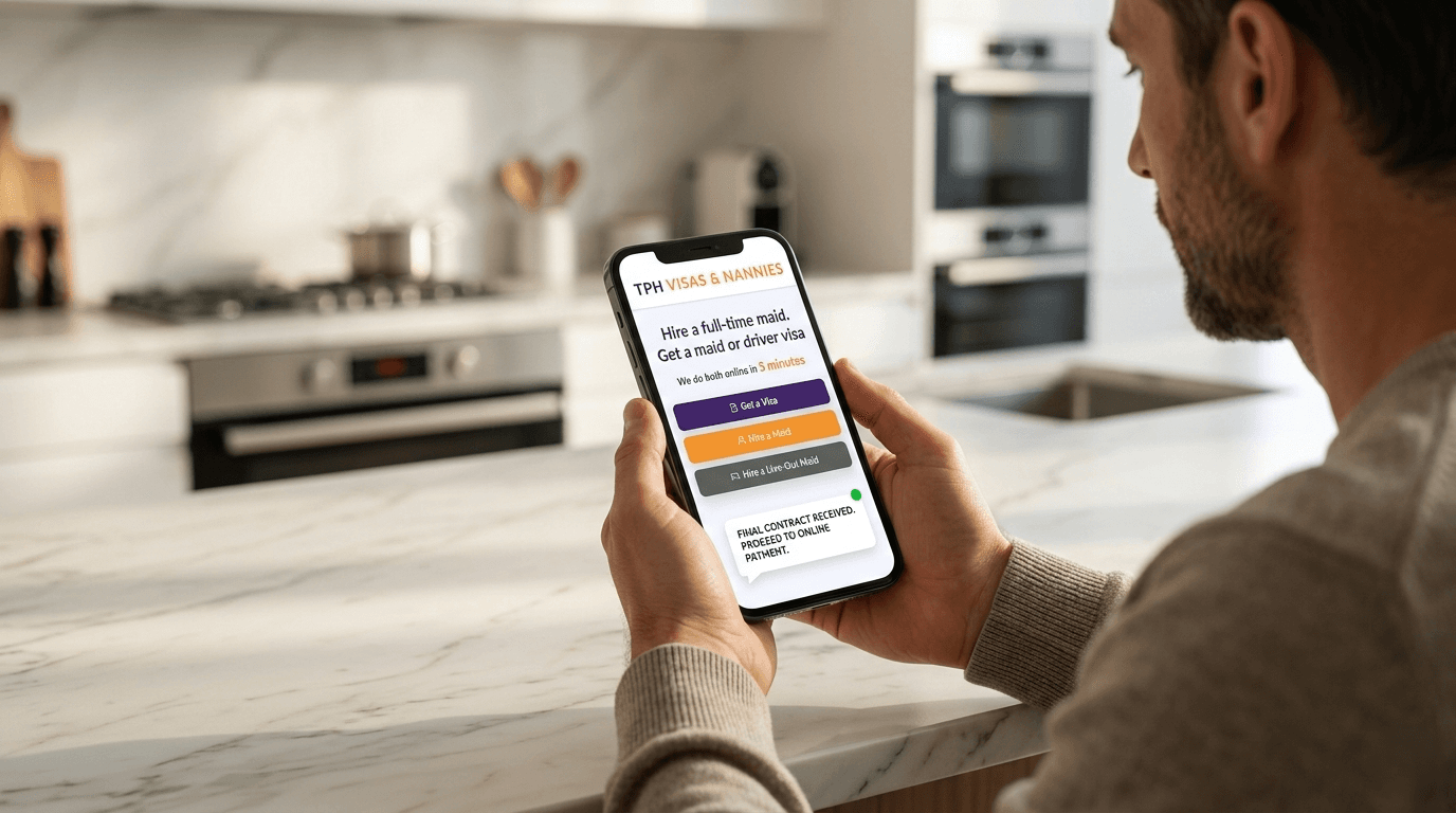 Man using smartphone to hire a maid in Dubai online from home kitchen